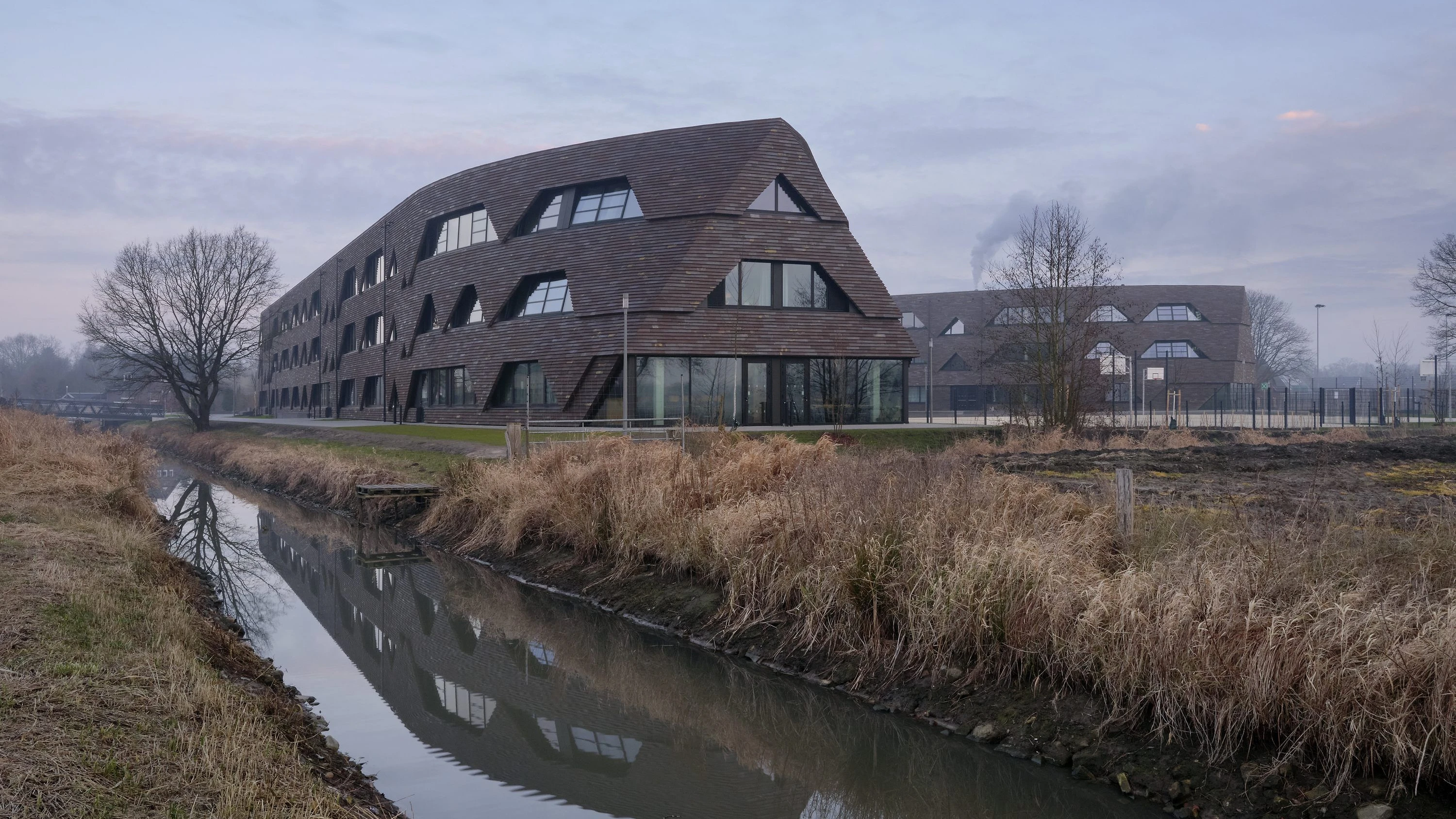 Schulbau: Eine glatte 1 für diesen Architekten