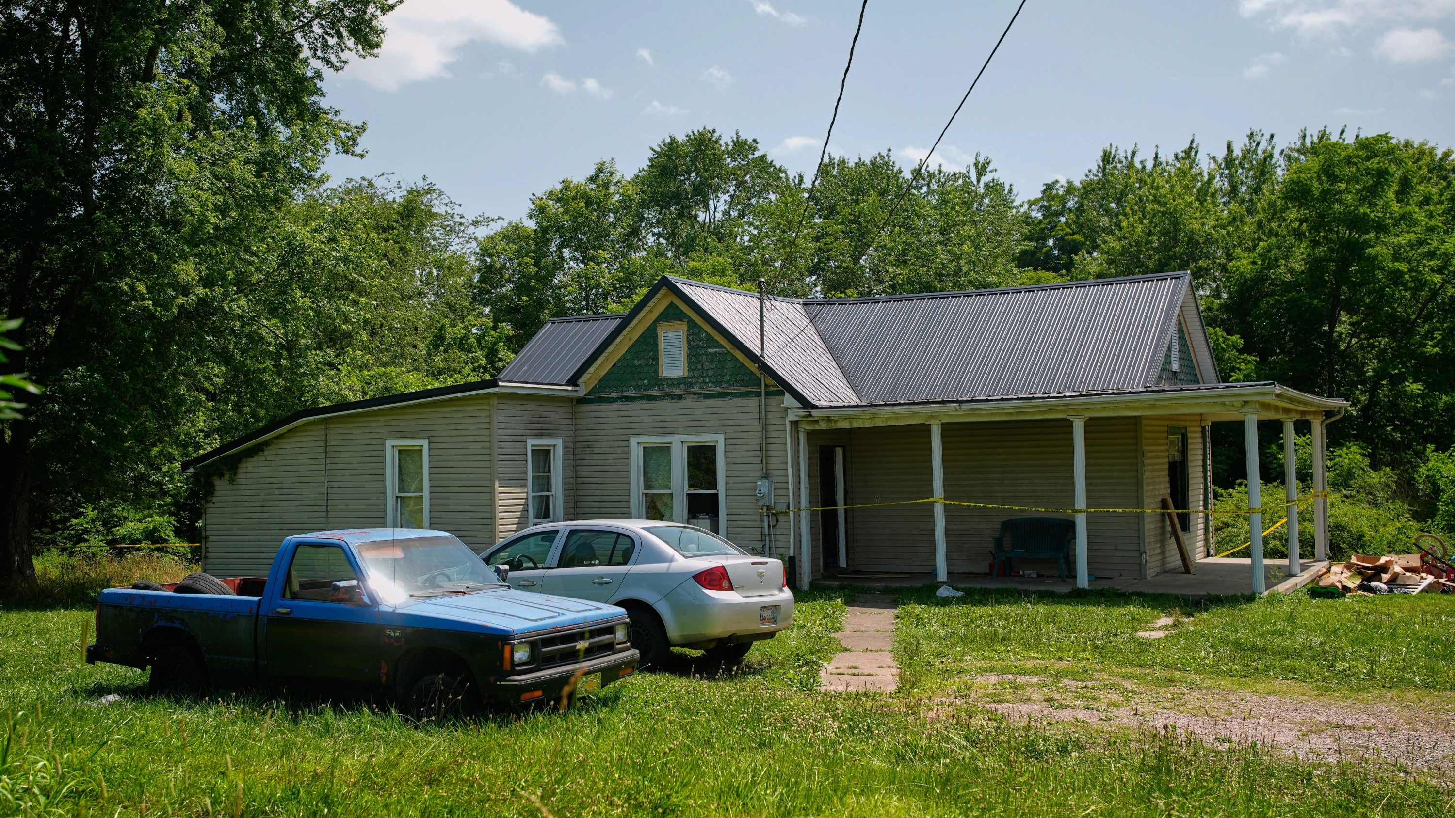 Das Haus der Familie ist mit einem gelben Band abgesperrt. - AP Photo/Carolyn Kaster