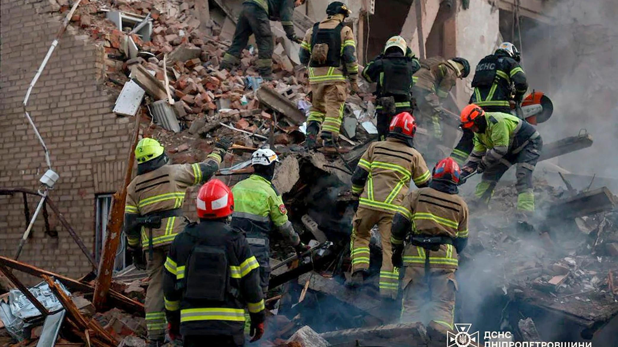 EPA: Russian Attacks Target Dnipro, Ukraine Reports Multiple People Trapped Under Rubble