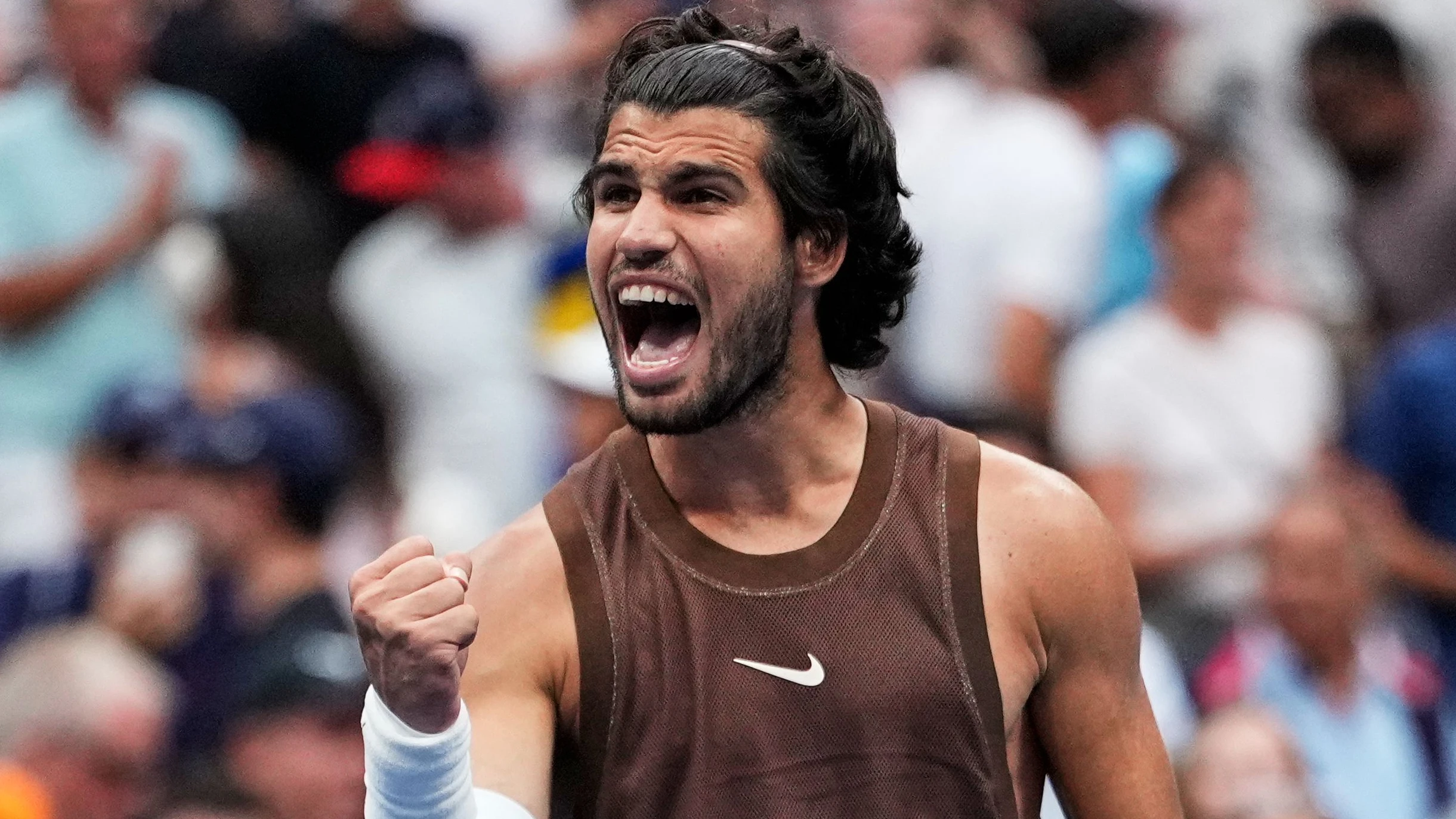 Hat wieder Spaß: Carlos Alcaraz bei den US Open - AP Photo/Seth Wenig