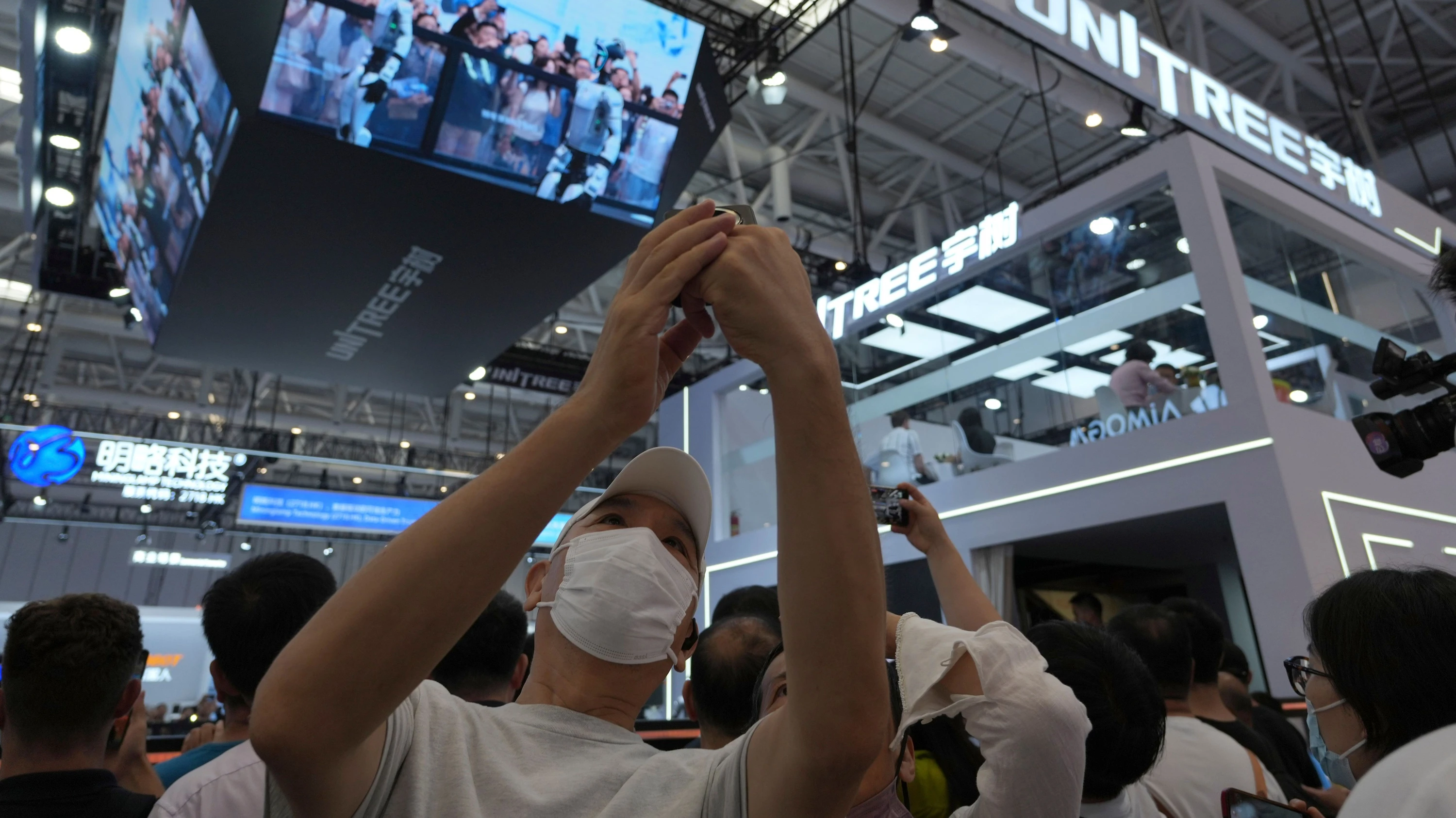 Unitree-Stand auf der World Robot Conference in Beijing am 20. August 2026 - AP Photo/Ng Han Guan
