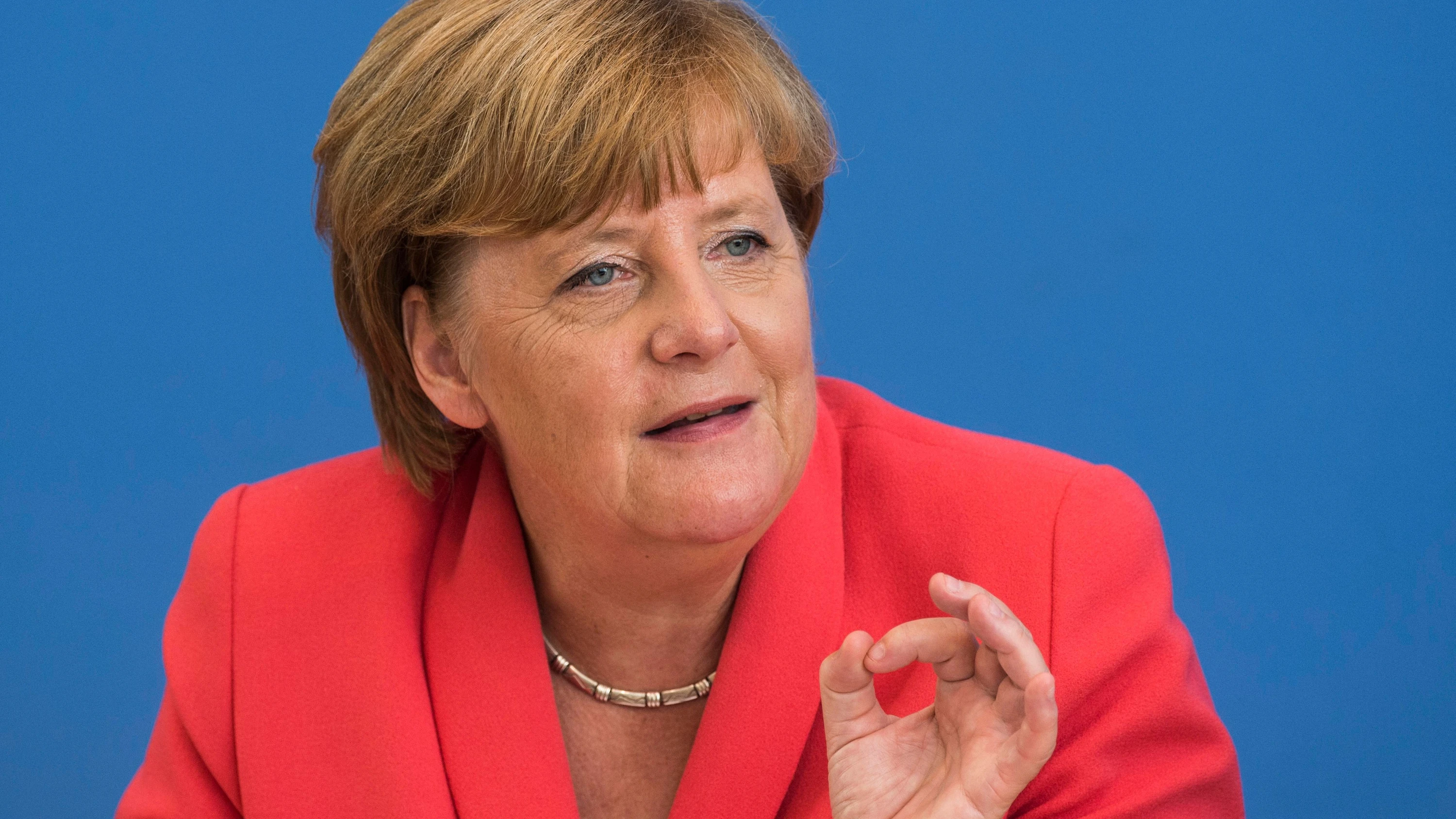 Merkel bei der Pressekonferenz 2015, in der sie „Wir schaffen das“ sagte - AFP