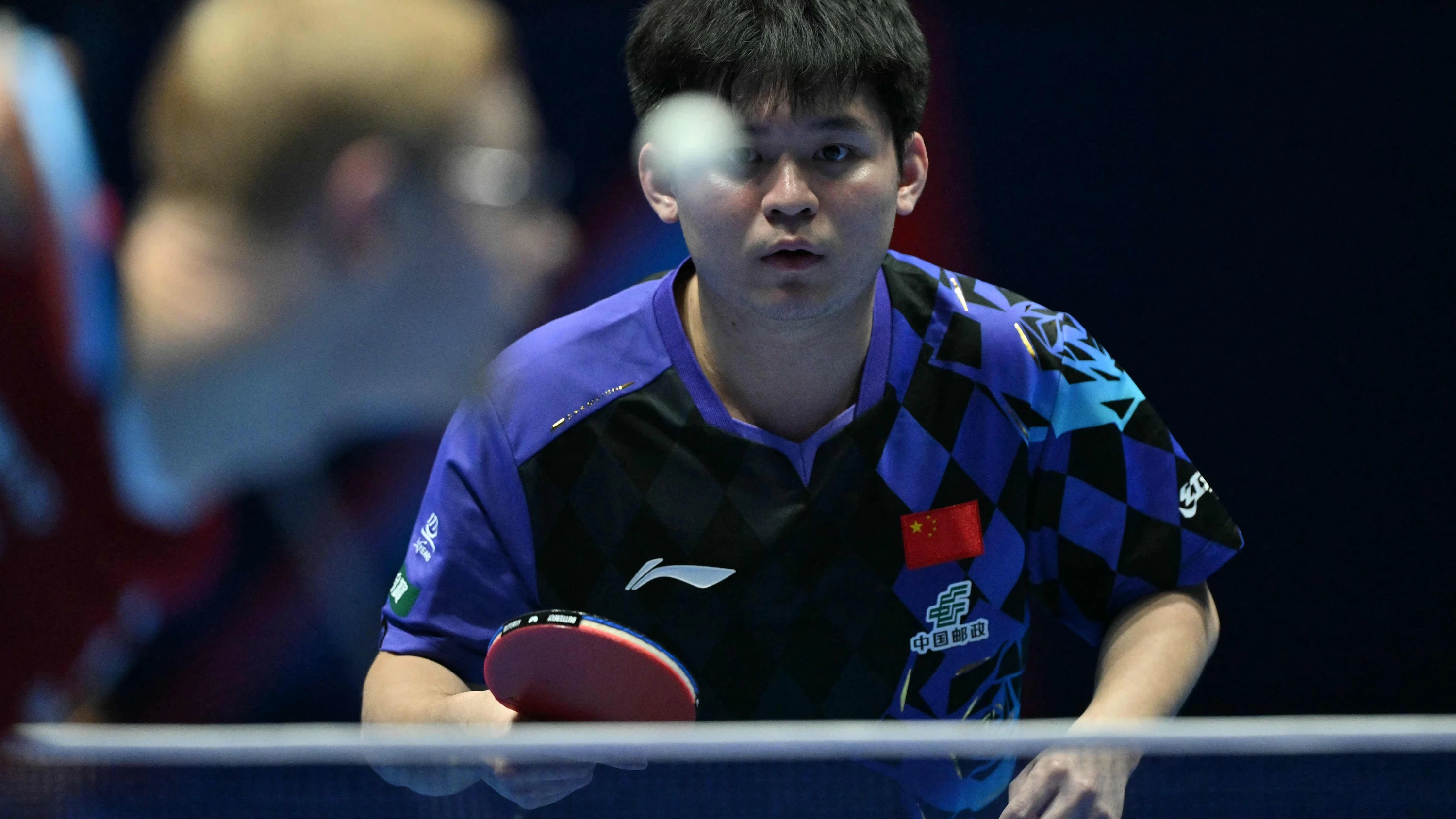 Lin Shidong und seine Landsleute haben im Tischtennis kein leichtes Spiel mehr gegen Frankreich und andere. - AFP