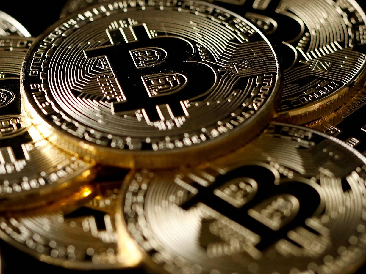 Neuer Rekord: Bitcoin steigt erstmals auf 60.000 Dollar | FAZ