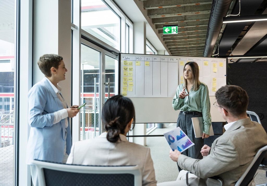 Teamwork and business presentation in a modern coworking office