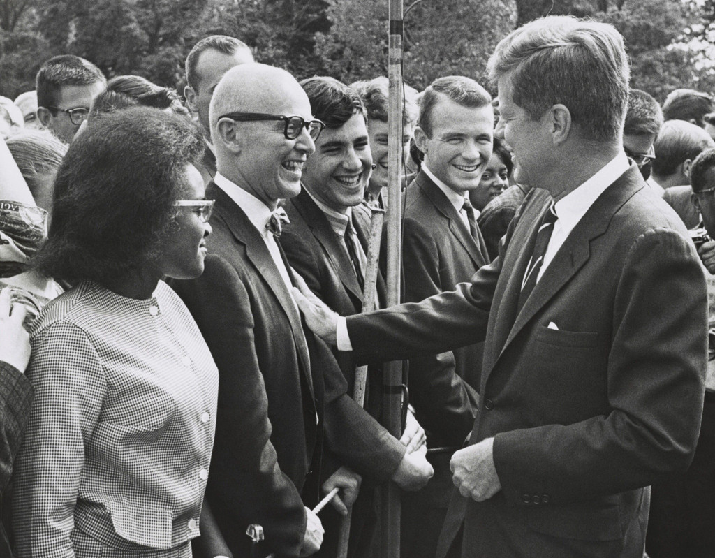 President John Kennedy meets with one of the first groups of Peace Corps volunteers. White House lawn, Aug. 21, 1961. (BSLOC_2015_2_225)