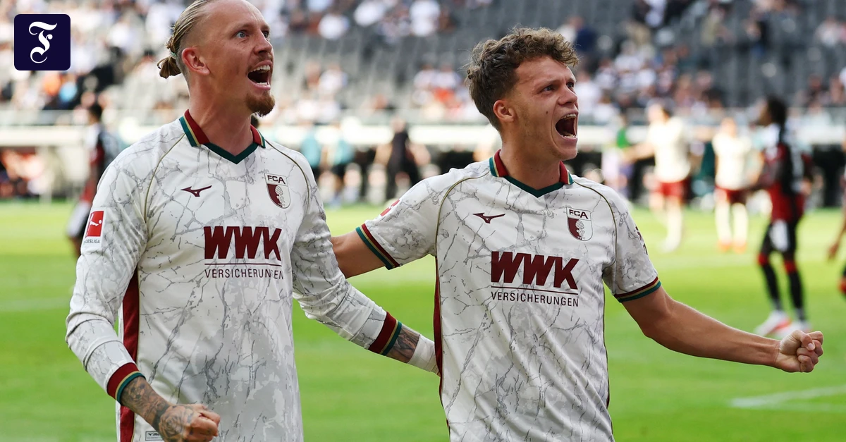 Photo: faz.net FC Augsburg Shocks Frankfurt with 4-1 Comeback Win to Claim Bundesliga Top Spot