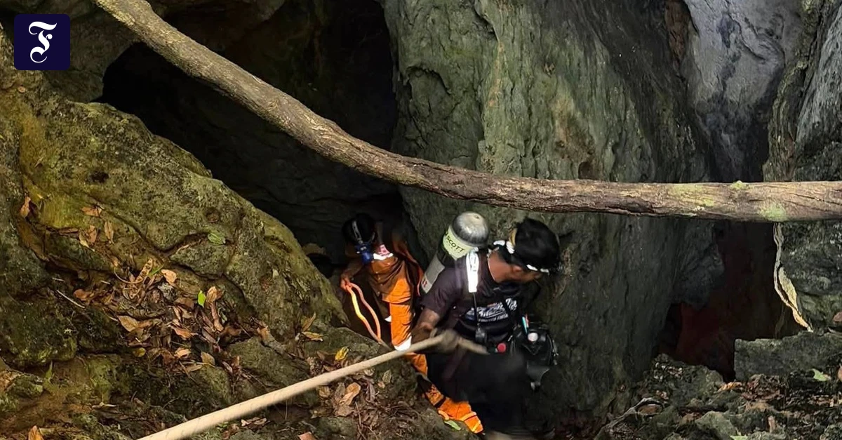 Five of seven missing people found in cave in Laos