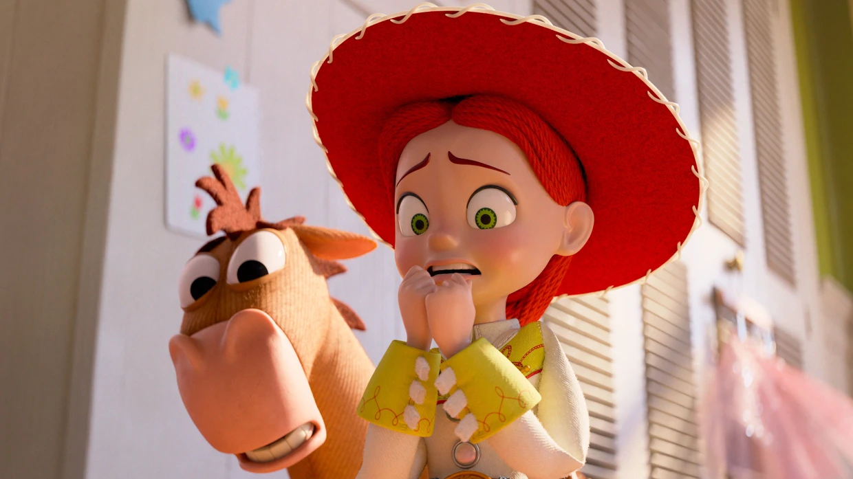 Entsetzt schauen Cowgirl Jessie und ihr Plüschpferd auf die elektronische Konkurrenz.