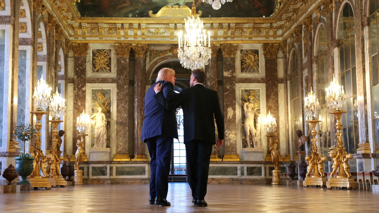 US President Donald Trump and French President Emmanuel Macron before their dinner together in Versailles.