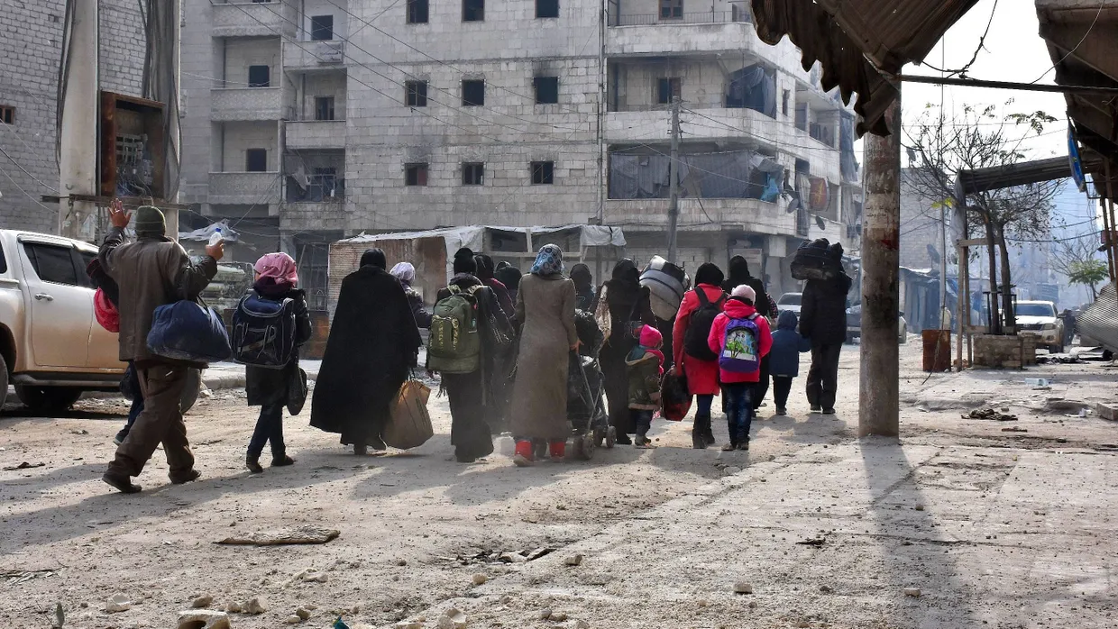 Einwohner der Stadt bei der Flucht vor dem Krieg in Aleppo