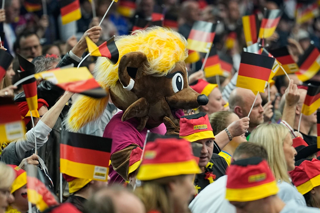 Good atmosphere: The German fans are cheering on their own team.
