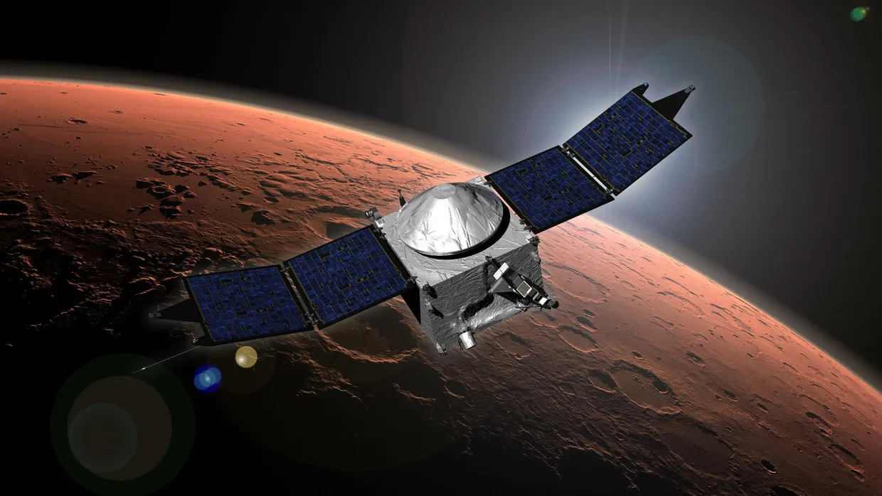 Künstlerische Darstellung der US-Forschungssonde «Maven» im Orbit des Mars.