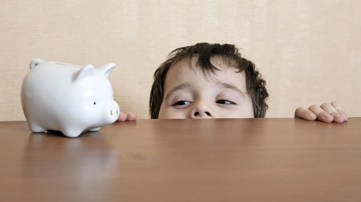 Früh übt sich: Kinder sollten nicht nur lernen, wie man spart, sondern auch, wie man Geld ausgibt.