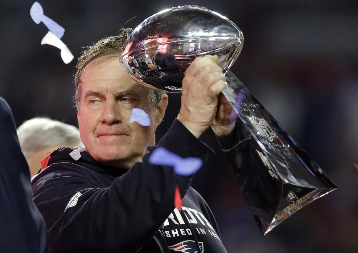 The object of desire: The Vince Lombardi Trophy. The Patriots, here with coaching legend Bill Belichick in 2015, have already won the Super Bowl six times.