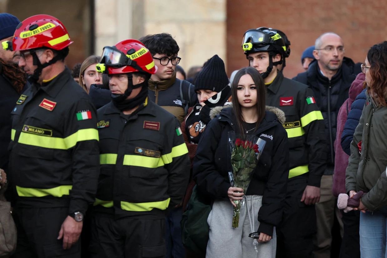 Roses for the dead: During the funeral service for Achille Barosi in Milan.