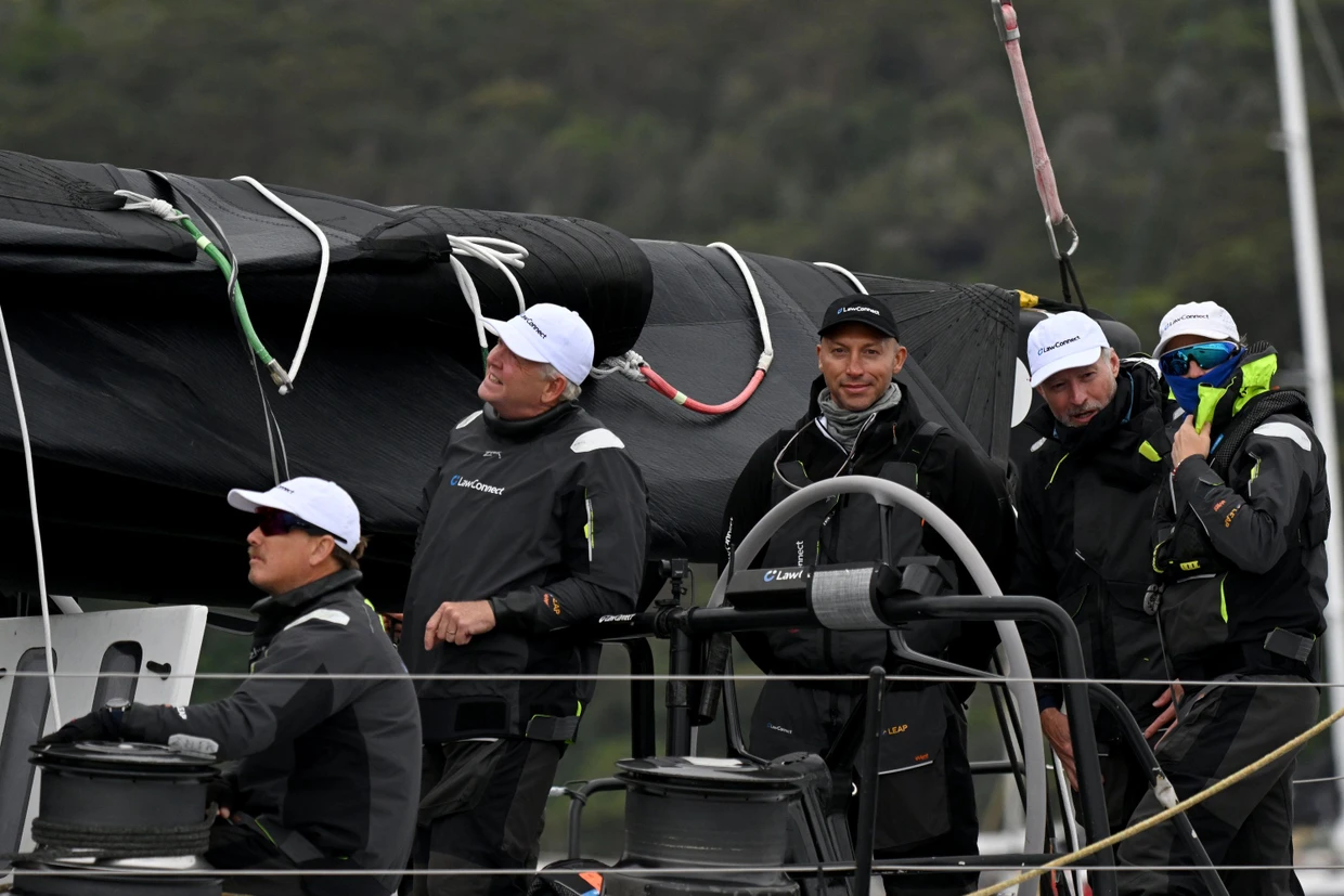 Celebrities on board: former swimmer Ian Thorpe (center) on board the Law Connect