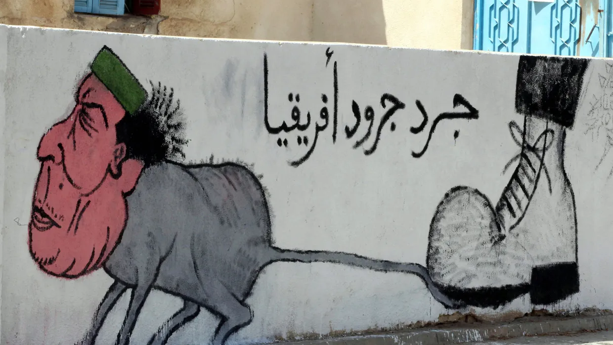 Gaddafi-Karikatur an einer Wand in Tripolis
