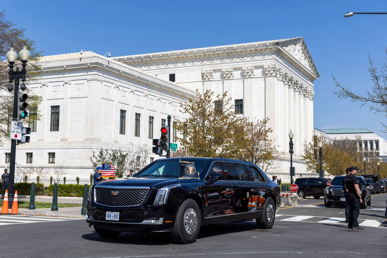 Donald Trump on his way back to the White House after his Supreme Court hearing on Wednesday