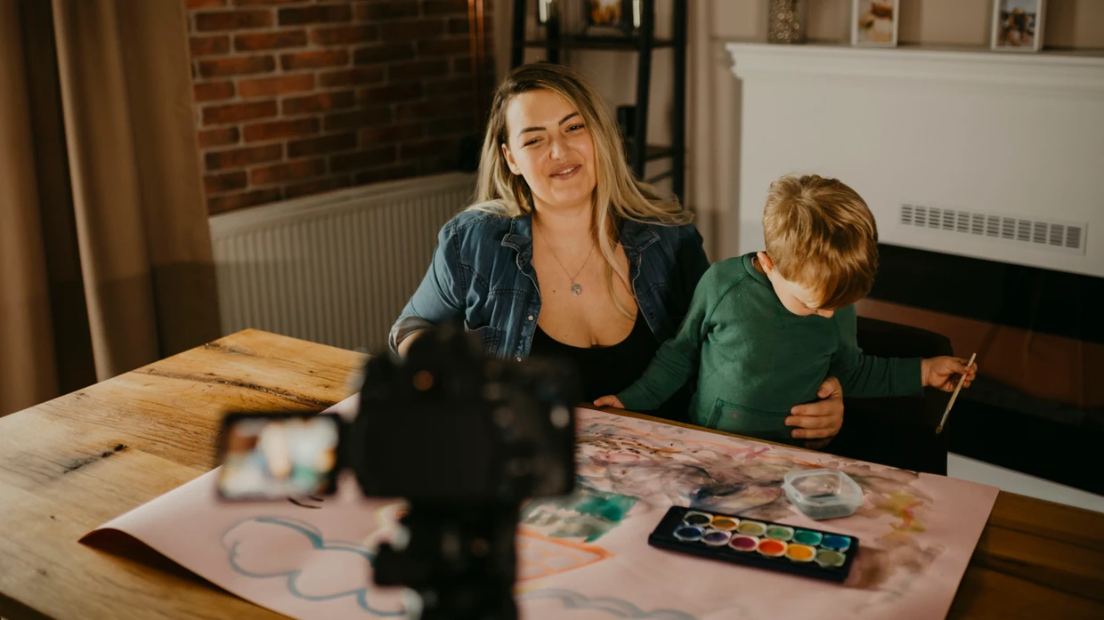 Mother and son paint and make a VLOG together