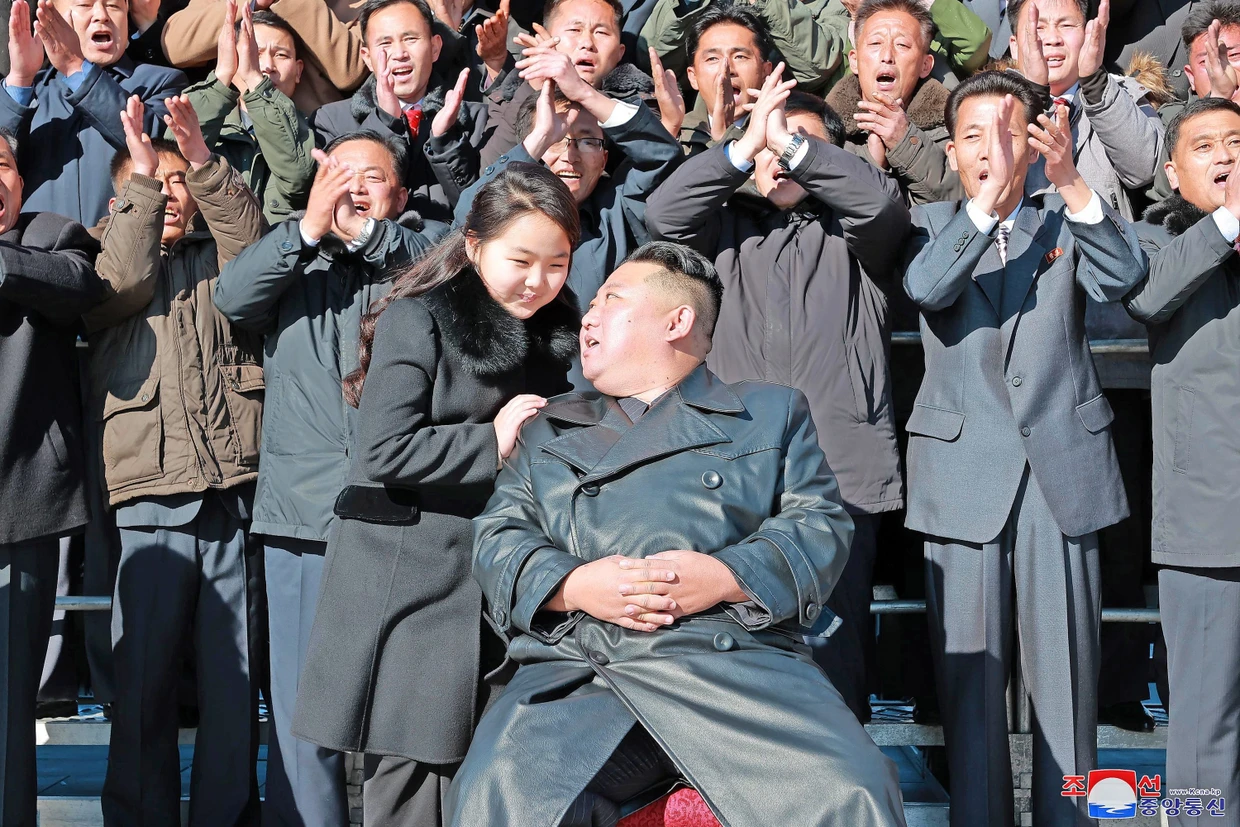 Dictator Kim Jong-un with his daughter Ju-ae demonstrating a ballistic missile