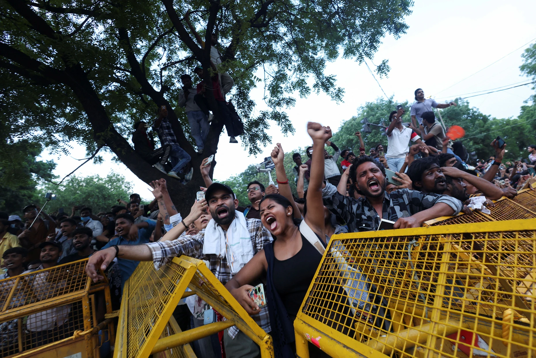 Cockroach Janta Party (CJP) supporters celebrate after the resignation of Education Minister Dharmendra Pradhan over National Eligibility cum Entrance Test (NEET) examination paper leaks, at Jantar Mantar in New Delhi, India, July 25, 2026. REUTERS/Priyanshu Singh