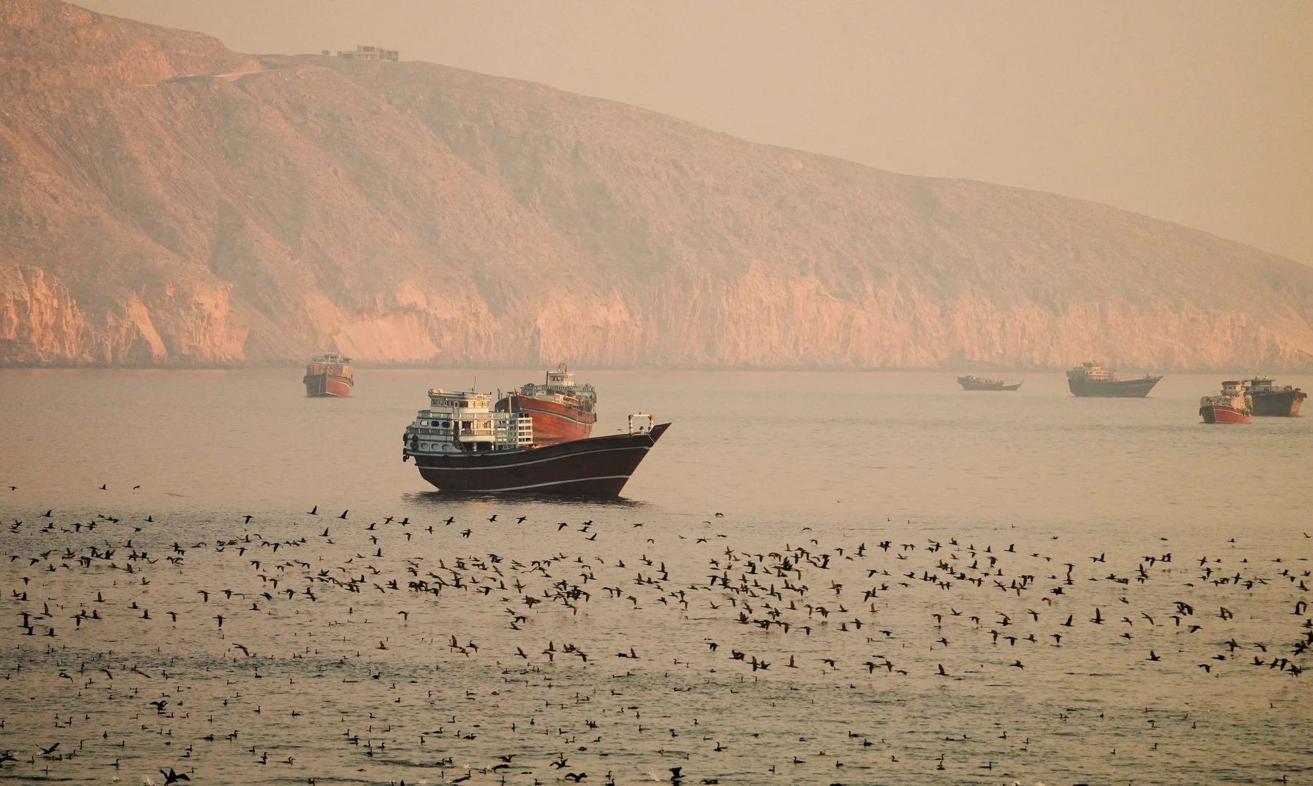 Vessels at the Strait of Hormuz, as seen from Musandam, Oman, June 16, 2026. REUTERS/Stringer