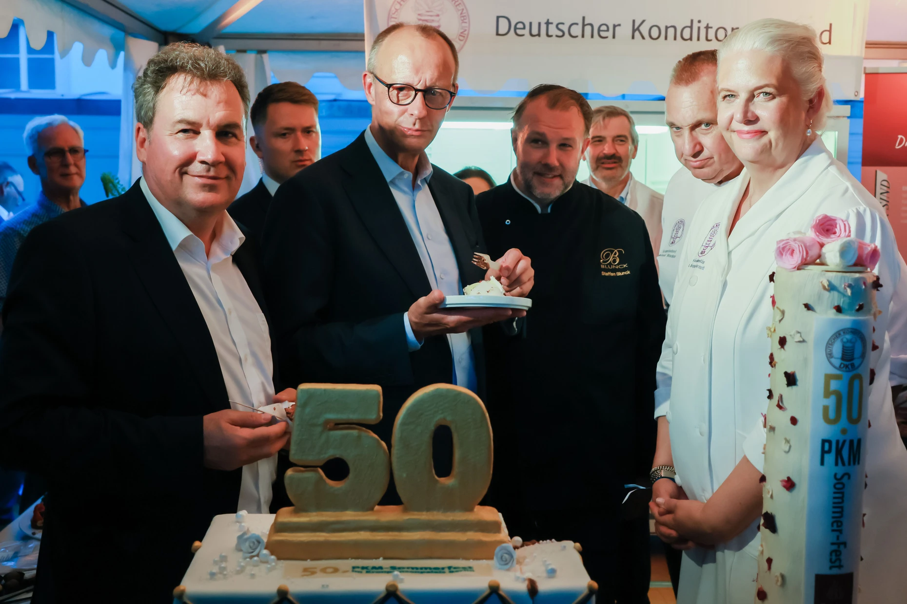 Christian von Stetten und Bundeskanzler Merz beim Sommerfest des Parlamentskreises Mittelstand im Juni in Berlin