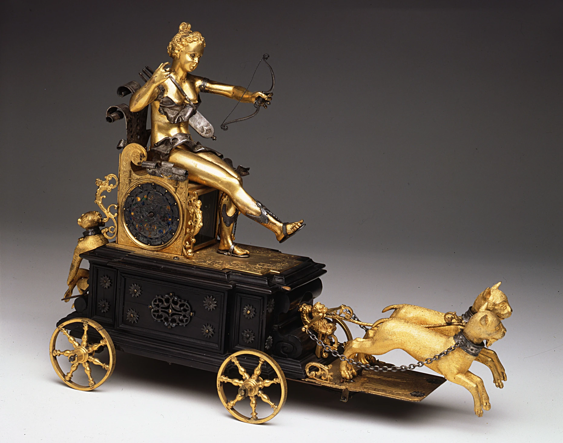  Tischuhr mit Jagdgöttin Diana auf einem Triumphwagen, 1610