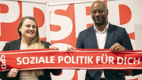 Mit Schal und Handschuh in den Bundestagswahlkampf