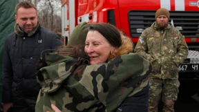 Merkel und Macron begrüßen Gefangenenaustausch