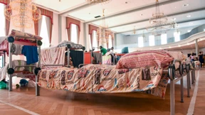 Grün-Rot zentralisiert Flüchtlingsaufnahme