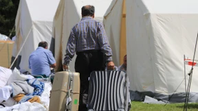 Innenminister will für Flüchtlinge Gesetze aussetzen