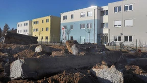 Flüchtlings-Container auf dem Schrott