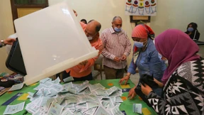 Die Urnenwahl als heiliger Akt