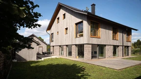 Holzhaus mit Dillputz