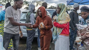 Migranten fliehen vor dem Mob aus Südafrika
