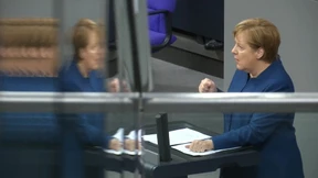 Merkel kämpft für UN-Migrationspakt