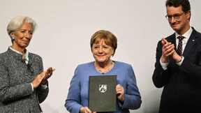 Wüst verteidigt NRW-Staatspreis für Angela Merkel