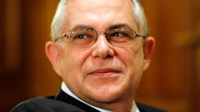 Papademos droht Gläubigern