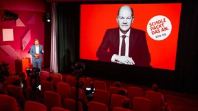 Mit Olaf Scholz auf rotem Grund