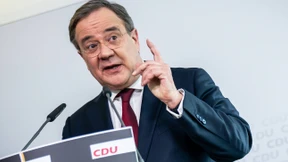 Merkels Drohung und Laschets Antwort