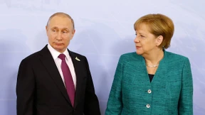 Merkel und Putin dringen auf friedliche Lösung