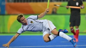 Hockey-Männer schlagen Japan