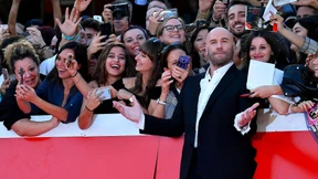 Travolta verdreht Fans den Kopf