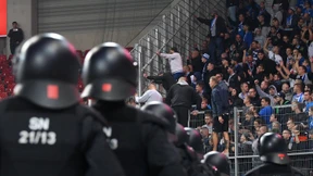 Warnschuss, um rivalisierende Gruppen zu trennen