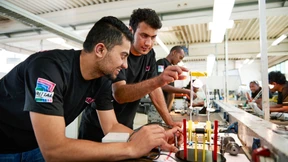 Wie deutsche Unternehmen den Flüchtlingen helfen