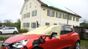 Unwetter lassen Allianz-Gewinn einbrechen