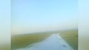 Augenzeugen filmen Notlandung im Maisfeld