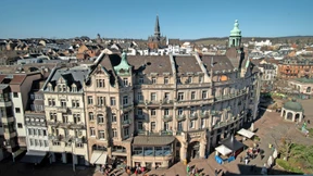 Flüchtlingsfamilien ziehen ins Palasthotel